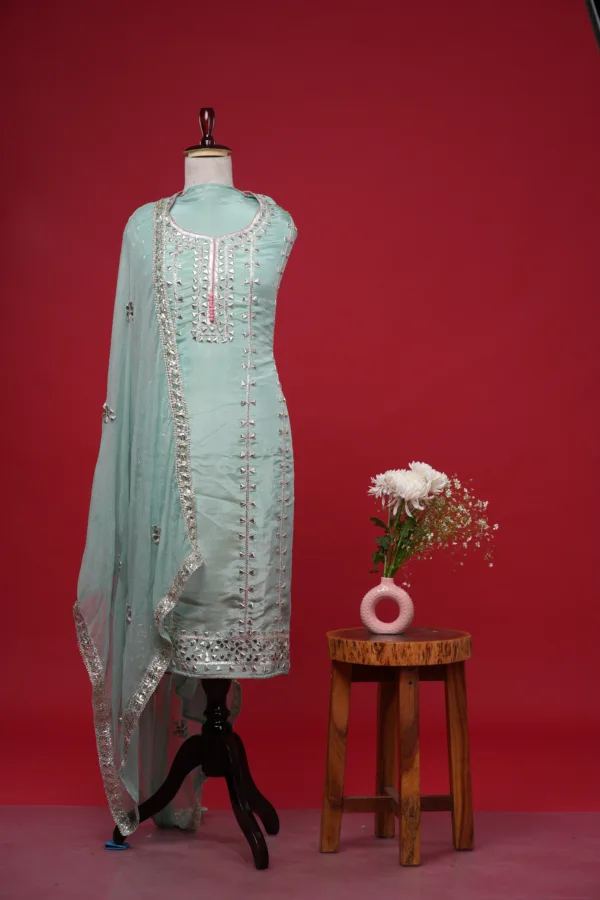 Pure cotton linen shirt with beautiful embroidery, paired with a cotton bottom and a pure cotton linen digital print dupatta, ideal for casual or festive wear.